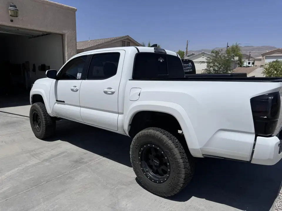Toyota Tacoma window tint: Removed faded tint from front doors, 3% all sides and rear windows, 50% full windshield, 5% sunstrip (view 2)