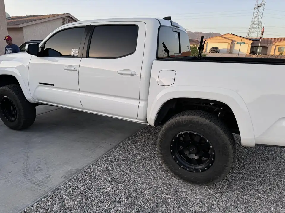 Toyota Tacoma window tint: Removed faded tint from front doors, 3% all sides and rear windows, 50% full windshield, 5% sunstrip (view 4)