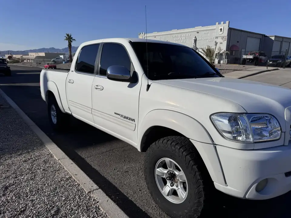 Toyota Tundra window tint: Removed all the old fading peeling tint and installed new 5% on sides and rear and sunstrip (view 2)