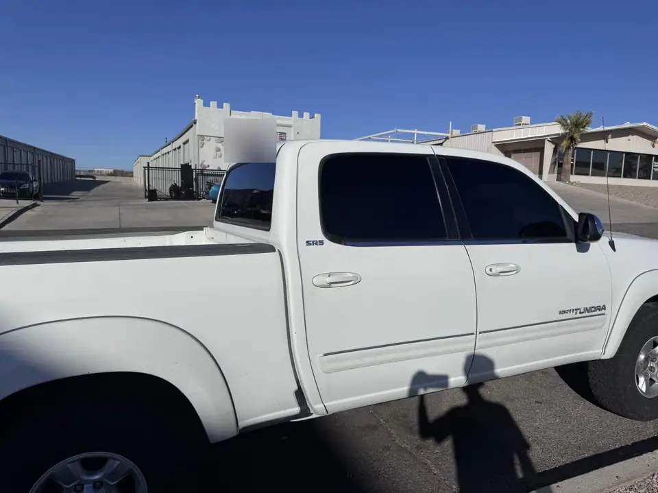 Toyota Tundra window tint: Removed all the old fading peeling tint and installed new 5% on sides and rear and sunstrip (view 3)