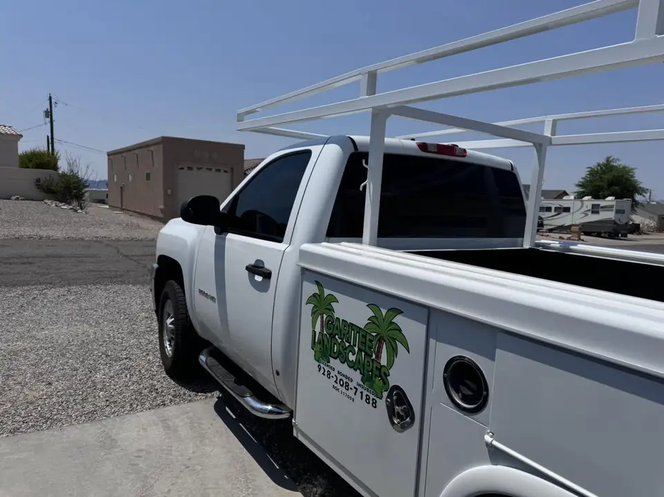 Two Chevy work trucks, window tint: 15% carbon ceramic rear window, 20% carbon ceramic side windows (view 3)