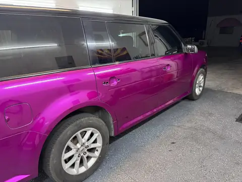 Two-tone wrapped SUV, front door tint and sunstrip: 25% on the front doors to match the rear, 5% sunstrip to top off the two-tone wrap