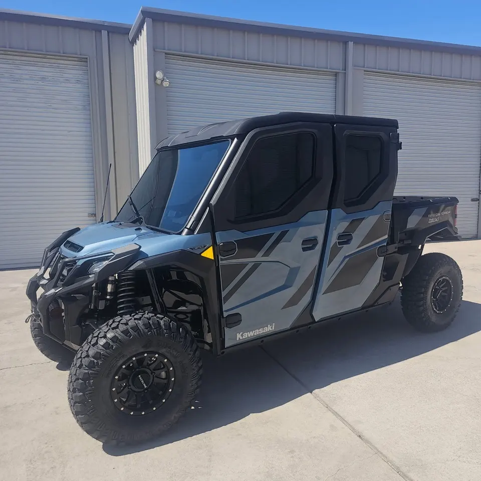 Side-by-side UTV with tinted cab enclosure
