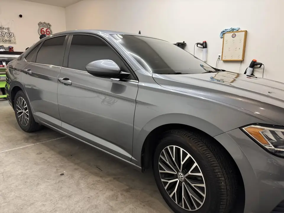 VW Jetta window tint: 3% all sides and rear, 50% full windshield, 3% sunstrip (view 2)