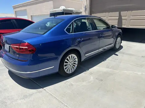 VW Passat window tint: Remove all old tint from sides and rear, 5% rear 3 windows, 15% front doors, 5% windshield strip (view 2)