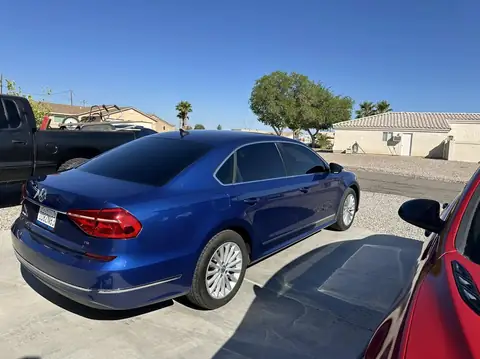 VW Passat window tint: Remove all old tint from sides and rear, 5% rear 3 windows, 15% front doors, 5% windshield strip (view 4)