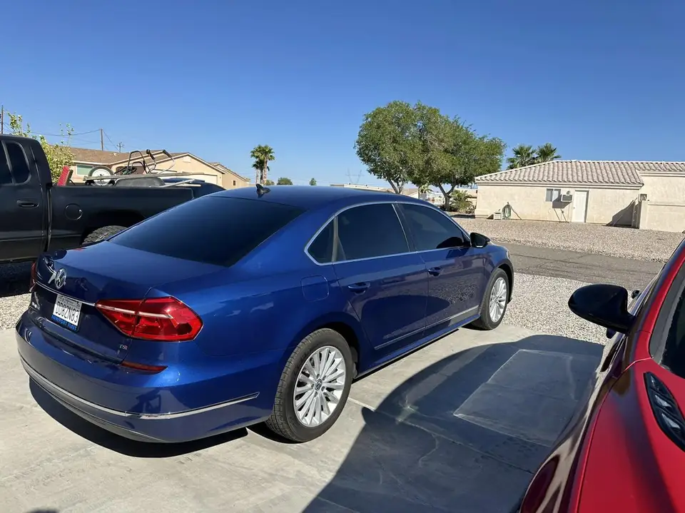 VW Passat window tint: Remove all old tint from sides and rear, 5% rear 3 windows, 15% front doors, 5% windshield strip (view 4)
