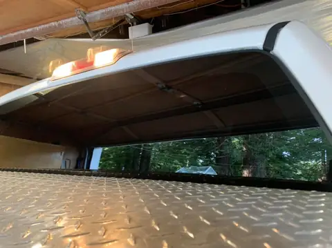 White pickup window tint: Customer came back for a second layer of 5% over the 5% we previously installed on the rear 3 windows and 5% medium visor (view 3)