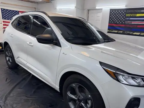 White SUV window tint: 5% Ceramic IR sides and rear, 35% Ceramic IR full windshield (view 2)