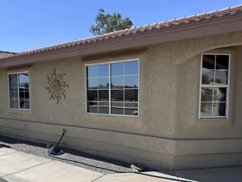 Whole-home film replacement in 35% dual reflective: We removed the 20yr old faded film from all windows in the home and installed our 35% dual (view 2)