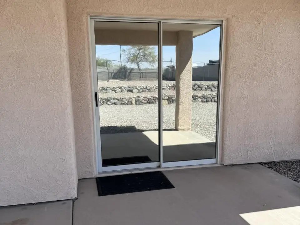 Whole house in 5% dual reflective film: Blocking out some serious heat with our 5% dual reflective installed on the full house (view 4)