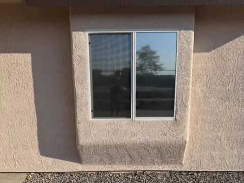 Whole house in 5% dual reflective film: Blocking out some serious heat with our 5% dual reflective installed on the full house (view 5)